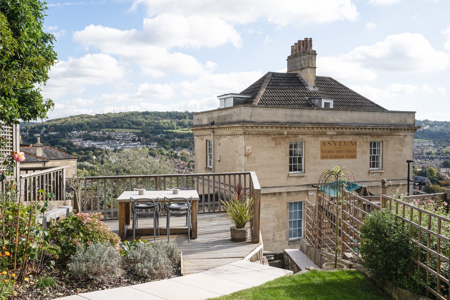Garden dining deck with sweeping views towards Bath and the green hills